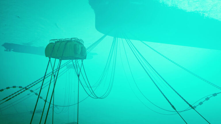 View of an existing subsea riser arrangement with midwater arch